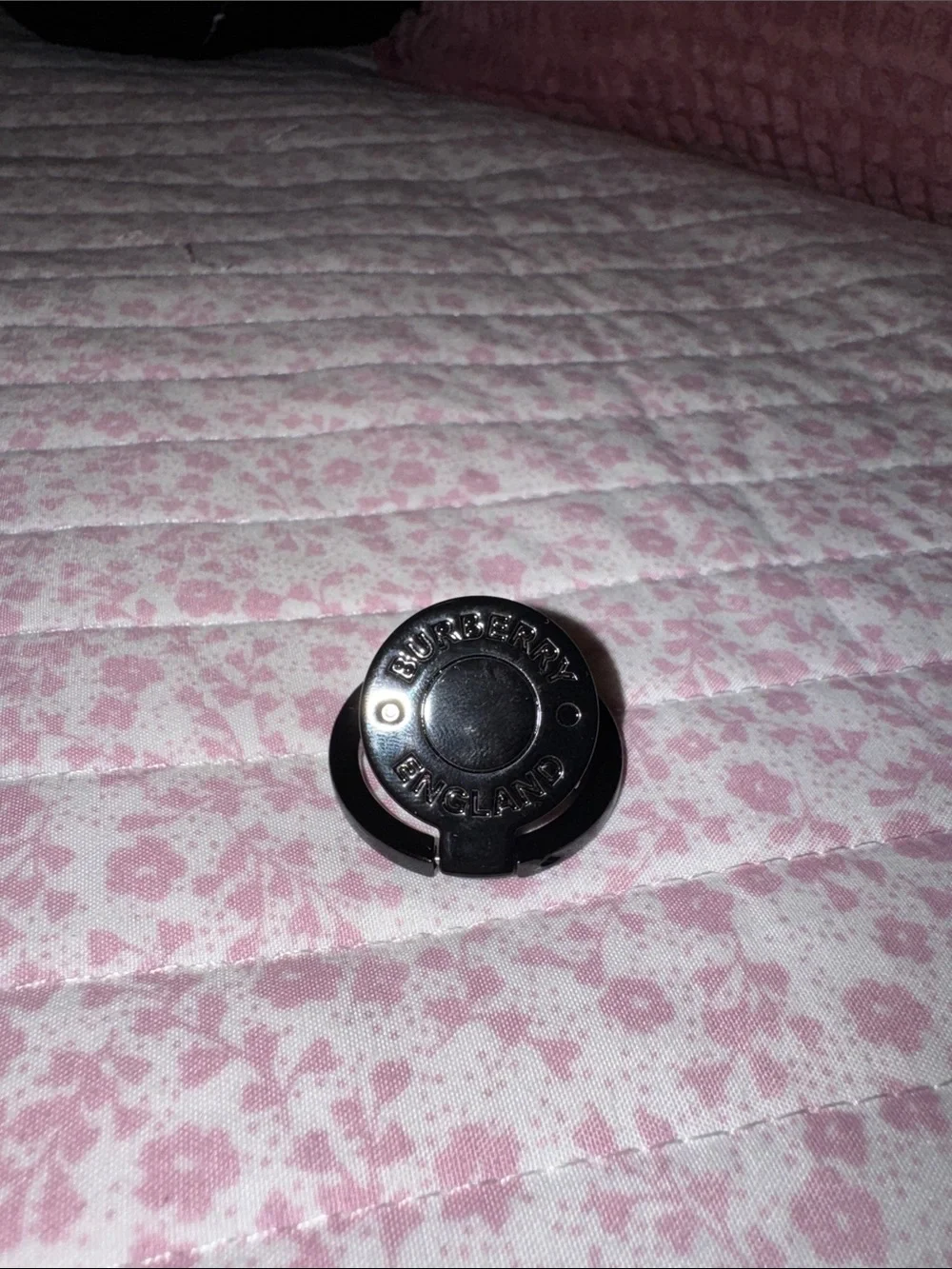 Burberry Black Rotating Phone Ring Holder with Branded Accent